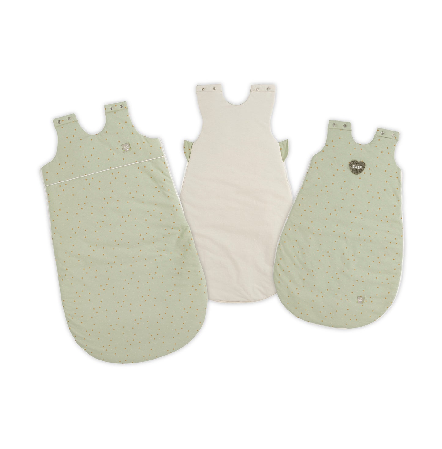 Übersicht des Ganzjahres mitwachsenden Jersey-Schlafsacks in der Designvariante Dotty mit zwei Vorderteilen und einem Rückteil, angeordnet zur Darstellung aller Teile.
