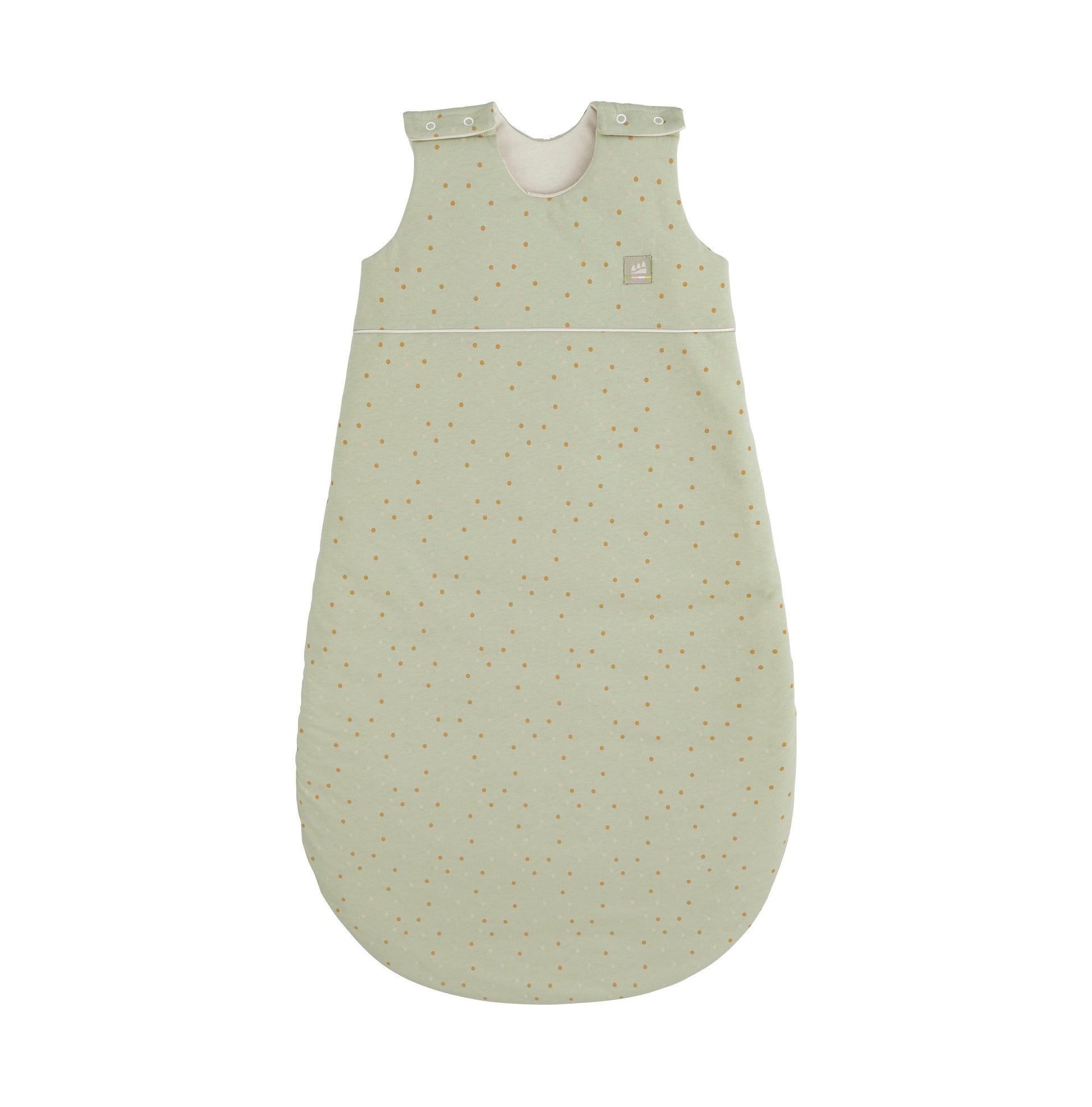 Detailaufnahme des Ganzjahres mitwachsenden Jersey-Schlafsacks für Babys in der Designvariante Dotty mit Punktmuster und sichtbarem Herz-Patch mit der Aufschrift „SLEEP“ in der großen Verstellung.